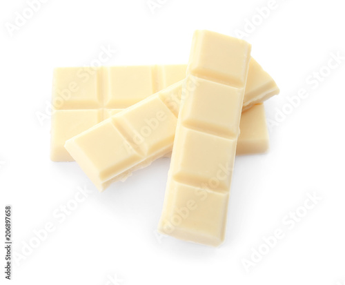 Delicious chocolate pieces on white background
