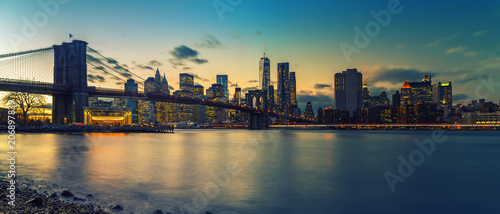 Brooklyn bridge and Manhattan after sunset, New York City © sborisov