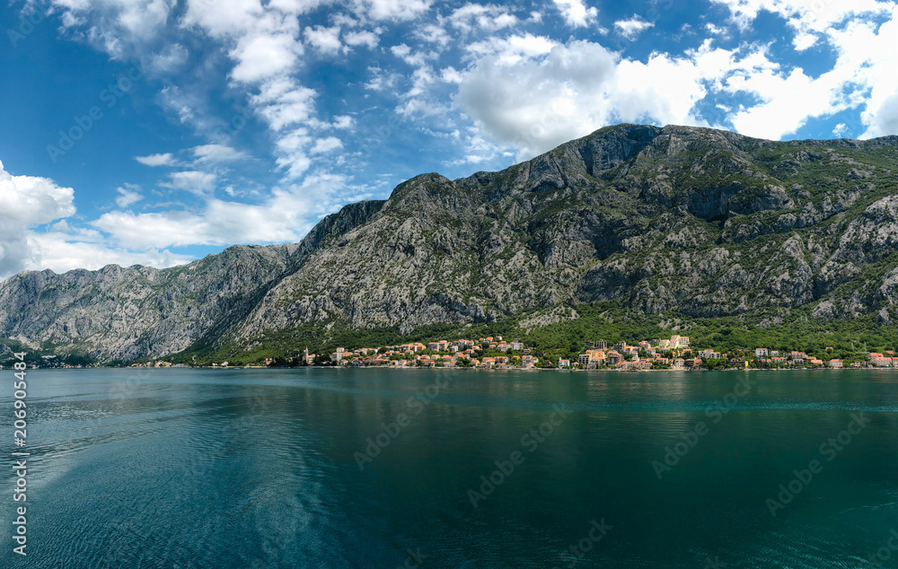 View on the town of Kotor in Montenegro, mountain view from the sea on a cruise