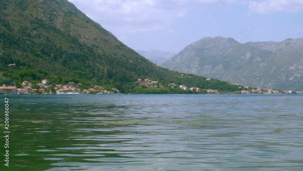 Sea surface and mountains in the background Sea surface and mountains in the background