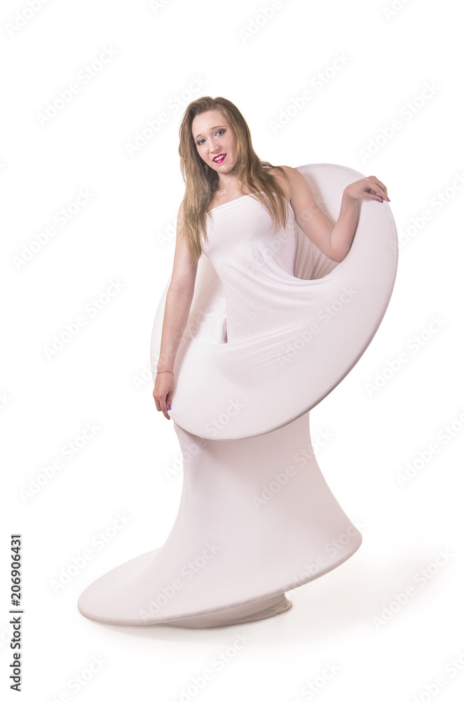 Young, smiling girl with long hair in white conceptual dress . Young, smiling girl with long hair in white conceptual dress .