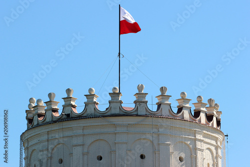 National Polish flag on Casimir Castle in Przemysl, Poland photo