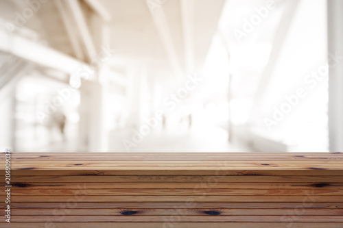 wooden pine table on top over blur background  can be used mock up for montage products display or design layout.