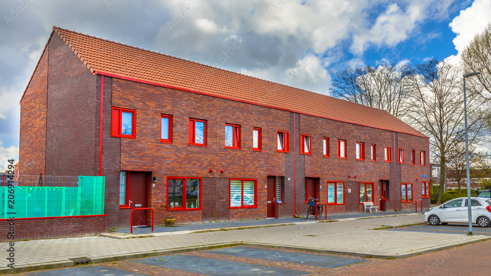 Modern street red brick row houses Modern street red brick row houses