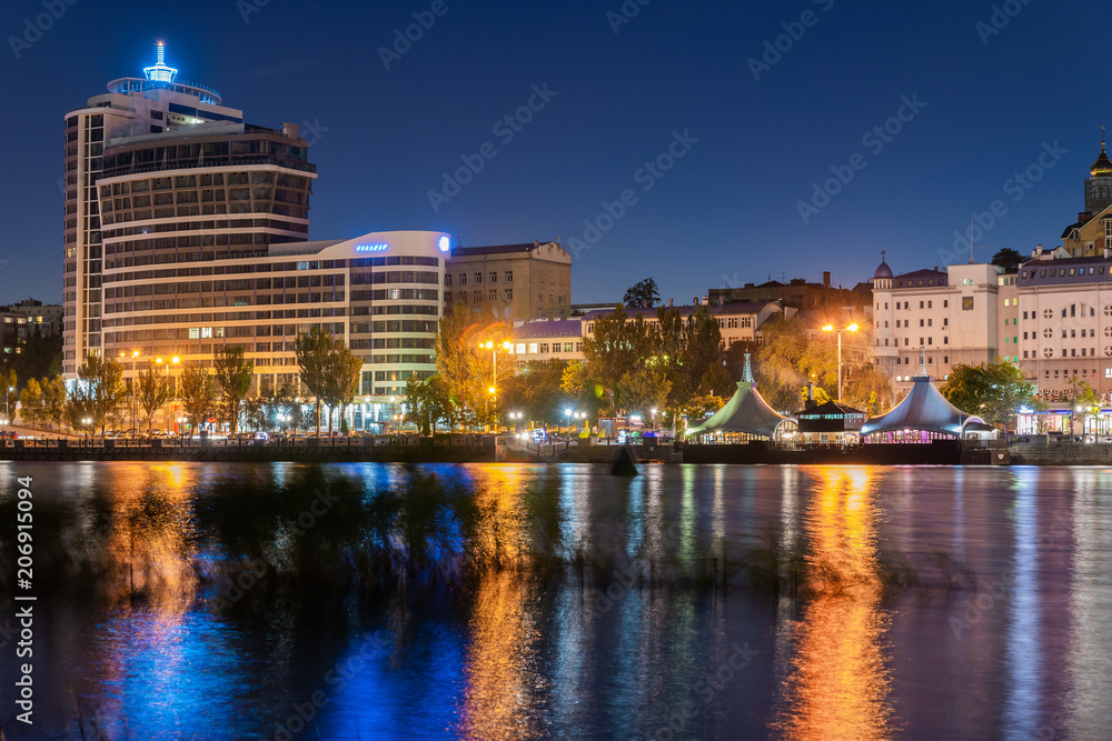 Panorama of night city with embankment of Rostov-on-Don