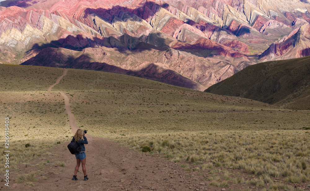 Fototapeta premium Beautiful woman photographer with dslr camera