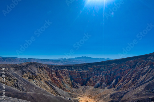 Sun rays over Ubehebe Crater in Death Valley National Park  California.