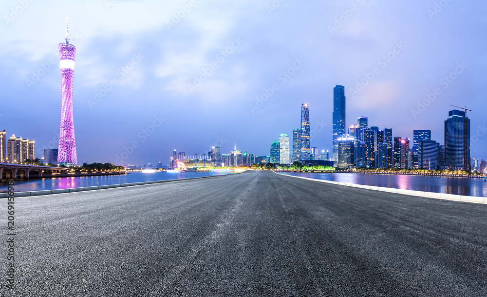 asphalt highway and modern city skyline in Guangzhou at night,China