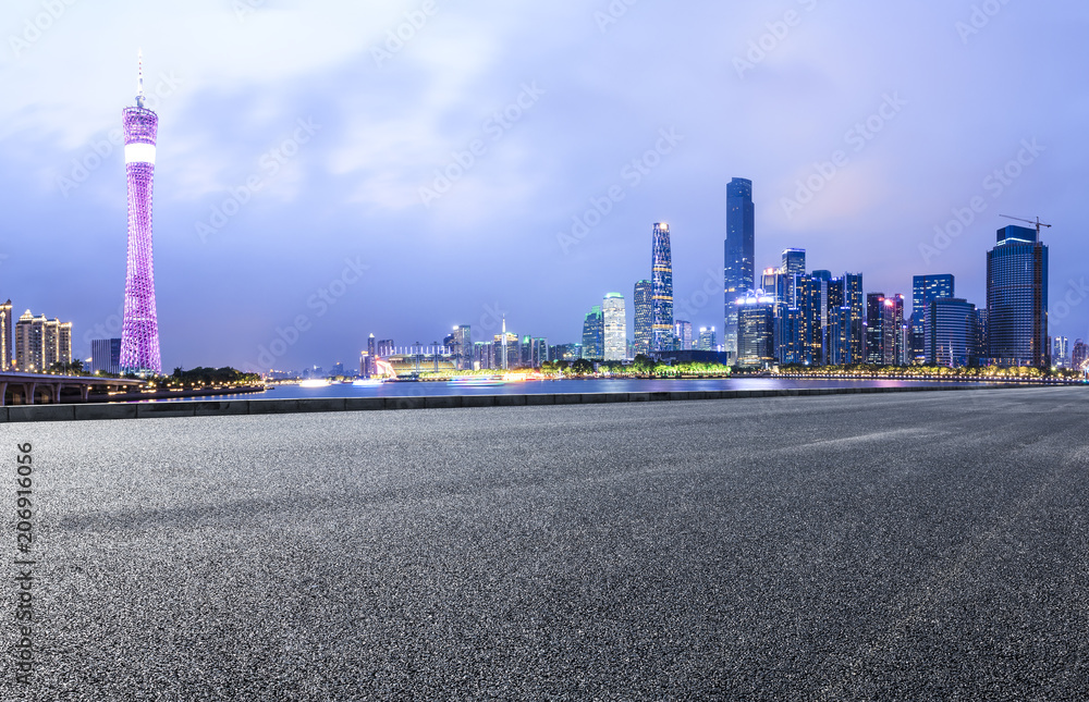 asphalt highway and modern city skyline in Guangzhou at night,China