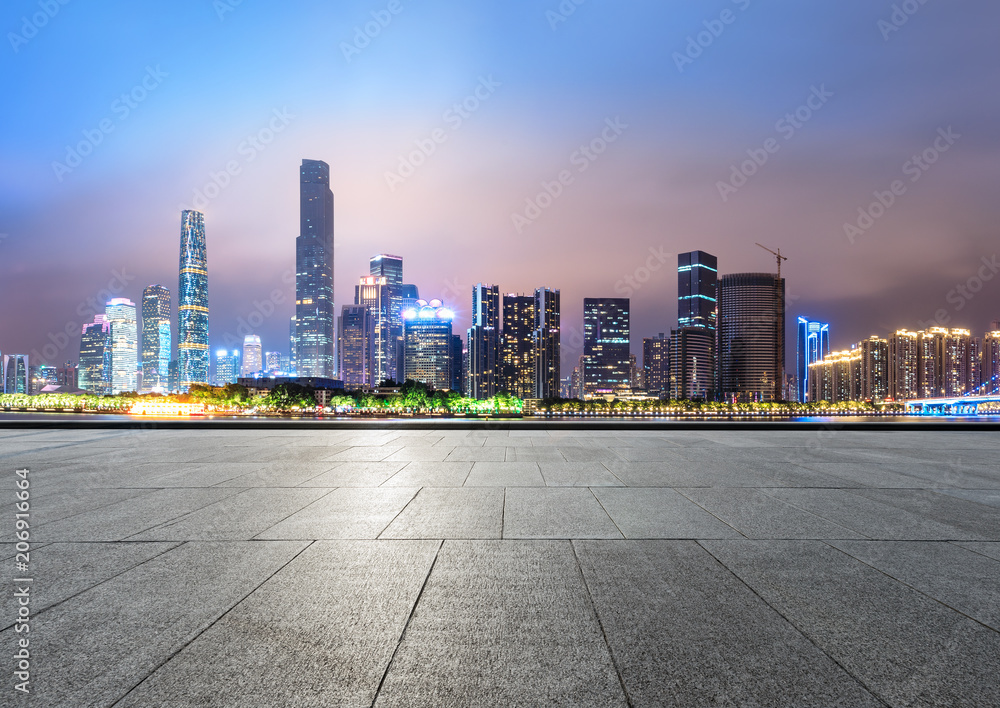 empty square floors and modern city skyline in Guangzhou at night,China