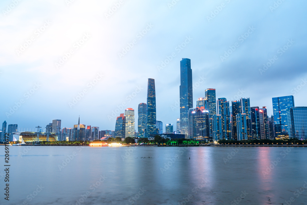 Guangzhou,China modern city skyline on the zhujiang river at night