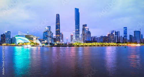 Guangzhou China modern city skyline panorama on the zhujiang river at night
