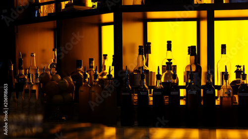 amber backlit generic bar bottles