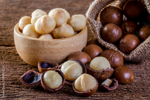 Macadamia nut on wooden table.