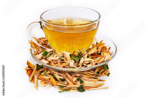 Dried Lemongrass tea In a glass  isolated White background