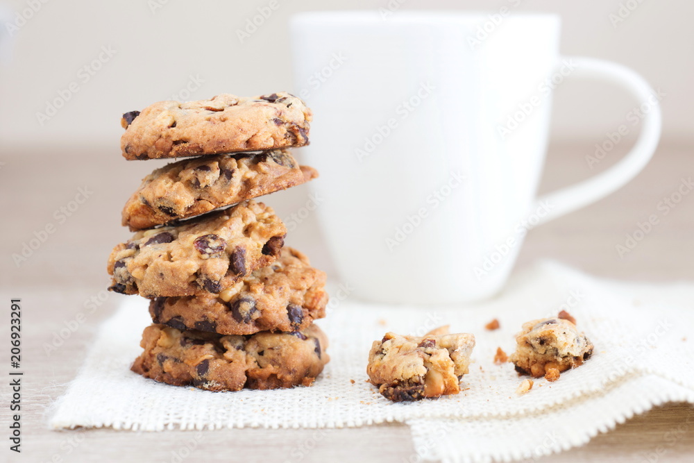 pile of bakery cookies on wooden table. pile of bakery cookies on wooden table.