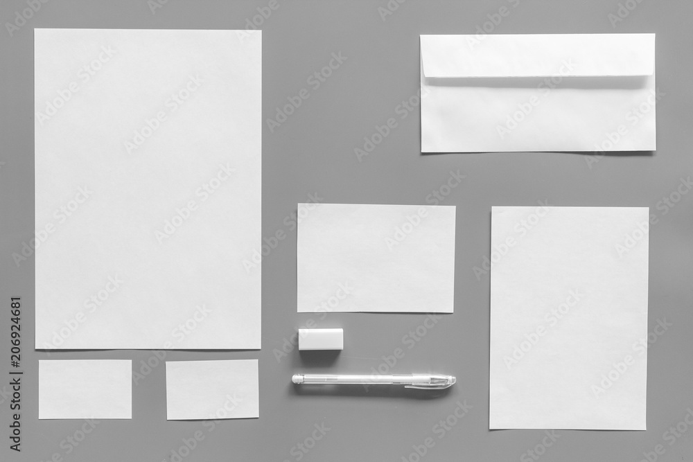 Mockup template for branding identity. White stationery on grey background top view. Pattern Mockup template for branding identity. White stationery on grey background top view. Pattern