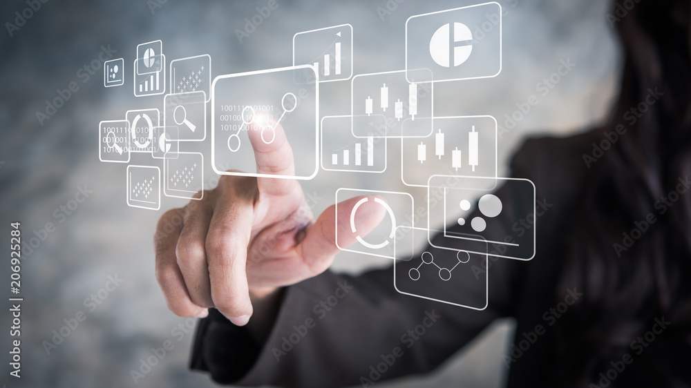 Big data analytics and business intelligence concept with chart and graph icons on a digital screen interface and a businessman in background Big data analytics and business intelligence concept with chart and graph icons on a digital screen interface and a businessman in background