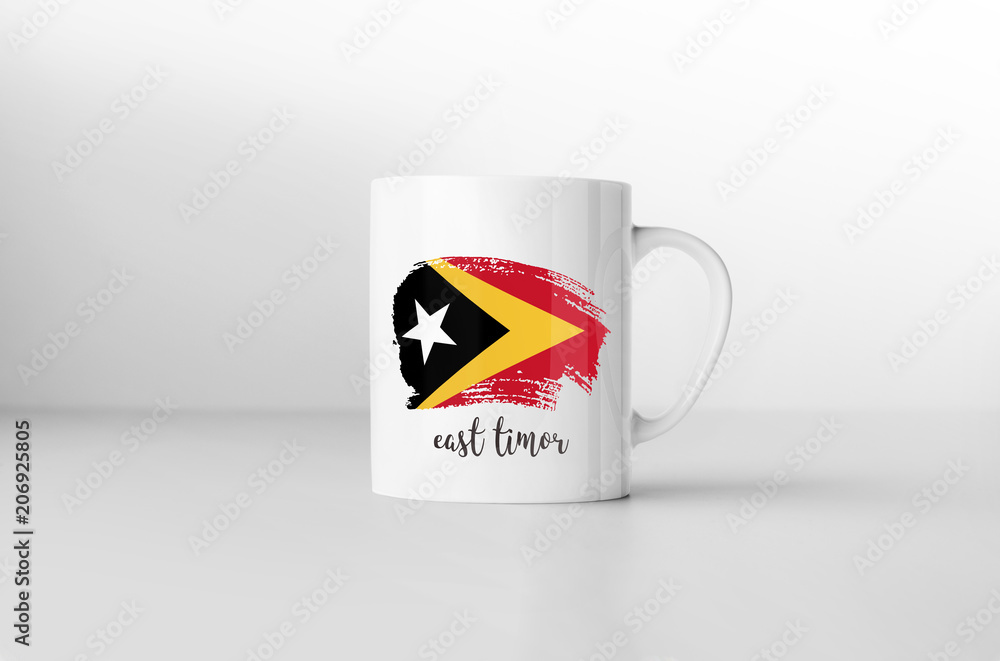 East Timor flag souvenir mug on white background. 3D rendering. East Timor flag souvenir mug on white background. 3D rendering.