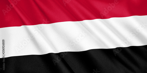 Yemen flag waving with the wind, wide format, 3D illustration. 3D rendering.