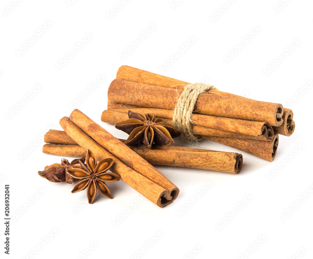 Close up the brown cinnamon stick with star anise spice isolated on white background , overhead and top view Close up the brown cinnamon stick with star anise spice isolated on white background , overhead and top view