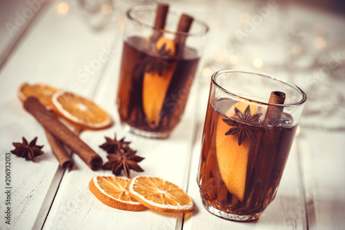 Mulled wine in night celebration of  New Year party and delicious Christmas drink for autumn and winter season