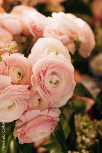 Beautiful spring bouquet with tender pink ranunculus flowers  elegant floral decoration