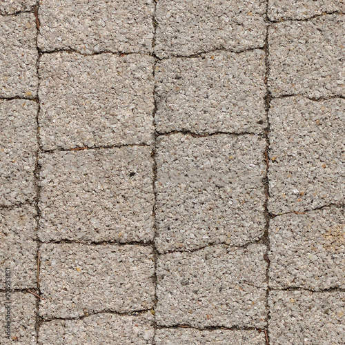 Seamless photo texture of pavement tile from natural stone photo