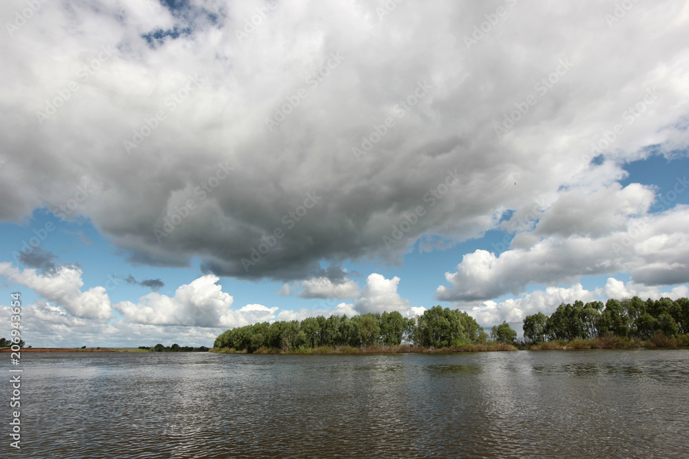 the beautiful landscape with low clouds over the river the beautiful landscape with low clouds over the river