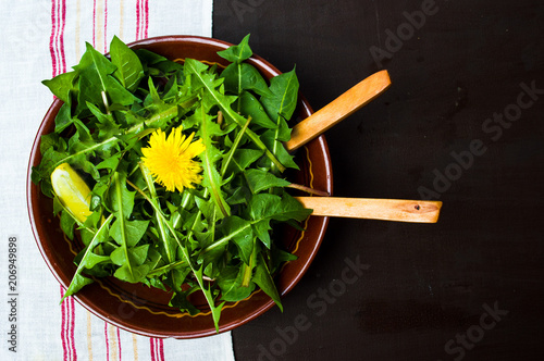 Dandelion salad in a bowl top view