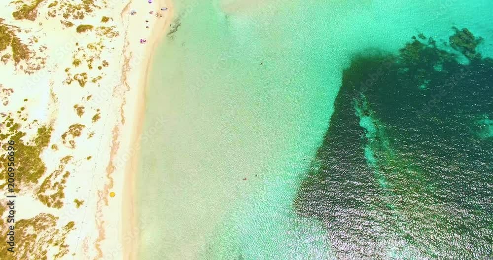 Aerial view of amazing, unspoiled and idyllic beach on a little island Aerial view of amazing, unspoiled and idyllic beach on a little island