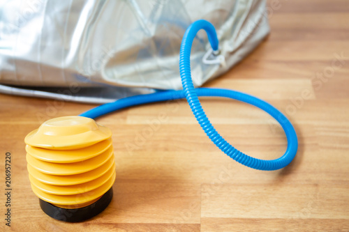 Simple universal plastic air pumper kit close up.