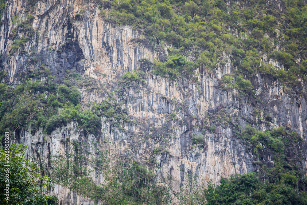 Photograph of high cliff in Asia background