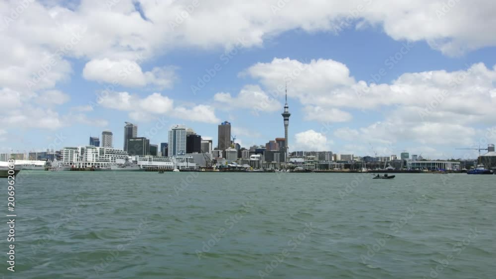 Tilting up from boat to Auckland city and Sky Tower Tilting up from boat to Auckland city and Sky Tower