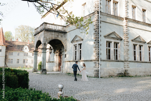 wedding beautiful couple in the evening in a castle © wolfhound911