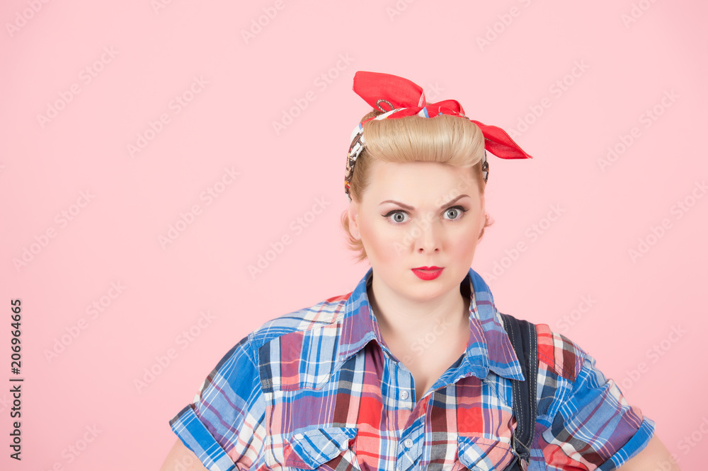 Portrait of blonde curl pin-up girl with red head scarf. Stylish
