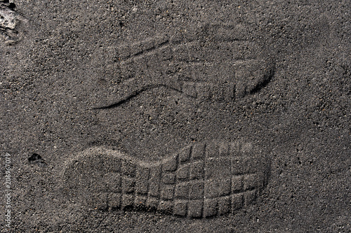 texture of sand. footprints in the sand. photo