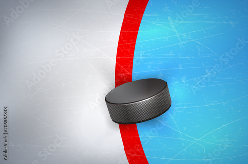 Hockey puck on ice - on red line of goalpost