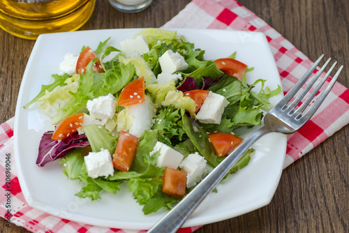 Dietary salad with tomatoes and feta cheese