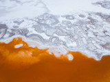 Orange water and salt formations of the lake of Colorada (Laguna Colorada), Sud Lipez province of Bolivia
