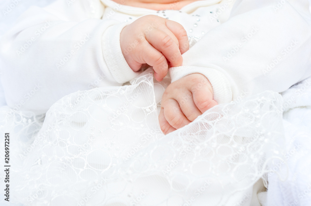 Little a newborn baby hands clenched in cam Little a newborn baby hands clenched in cam