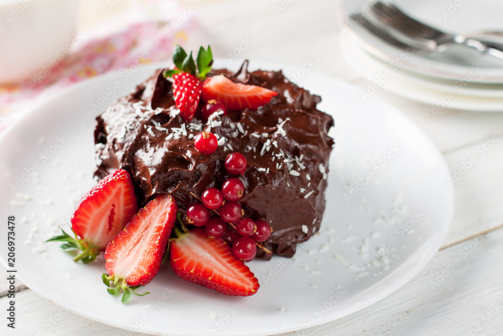 Raw chocolate and beetroot cake with berries Raw chocolate and beetroot cake with berries