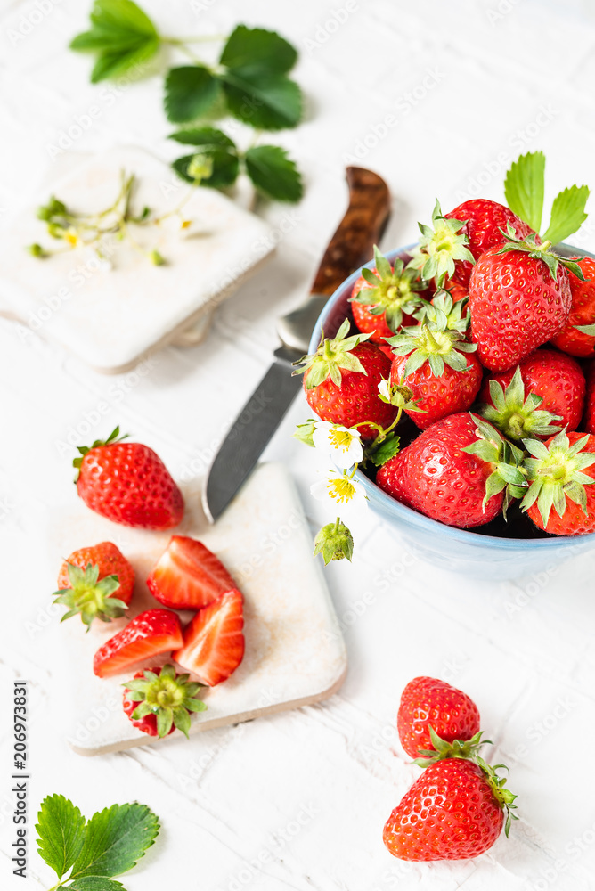 freshly picked strawberries in a bowl freshly picked strawberries in a bowl