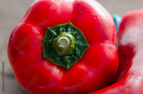 red peppers, on table with brown tablecloth