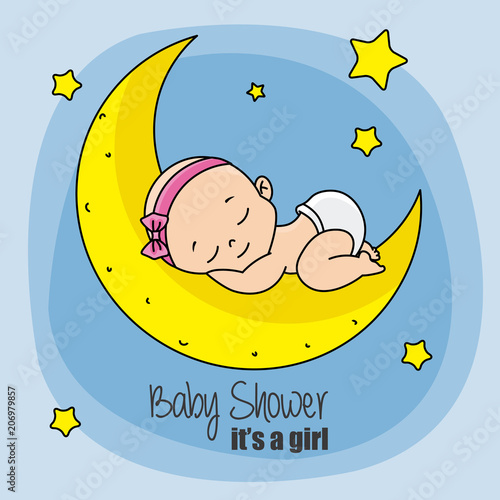 baby girl sleeping on top of the moon