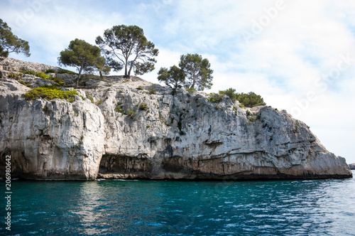 The famous Calanques national park of Cassis (near Marseilles in Provence, France) - blue turquoise water, white rocks, green pinewood.