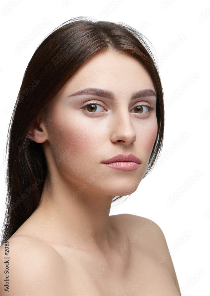 sideview of a girl with light day make up looking at camera. model having beatiful face with nice smile, plump lips, big eyes, white teeth. Dark brown hair, opened shoulders. White studio background. sideview of a girl with light day make up looking at camera. model having beatiful face with nice smile, plump lips, big eyes, white teeth. Dark brown hair, opened shoulders. White studio background.