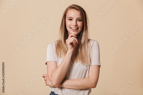 Portrait of a cheerful casual girl looking at camera