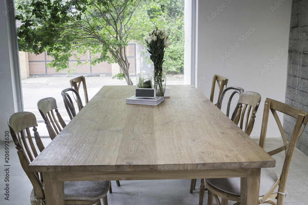 Fototapeta premium Wooden dining table in coffee shop