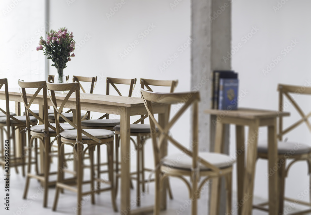 Wooden dining table in coffee shop Wooden dining table in coffee shop
